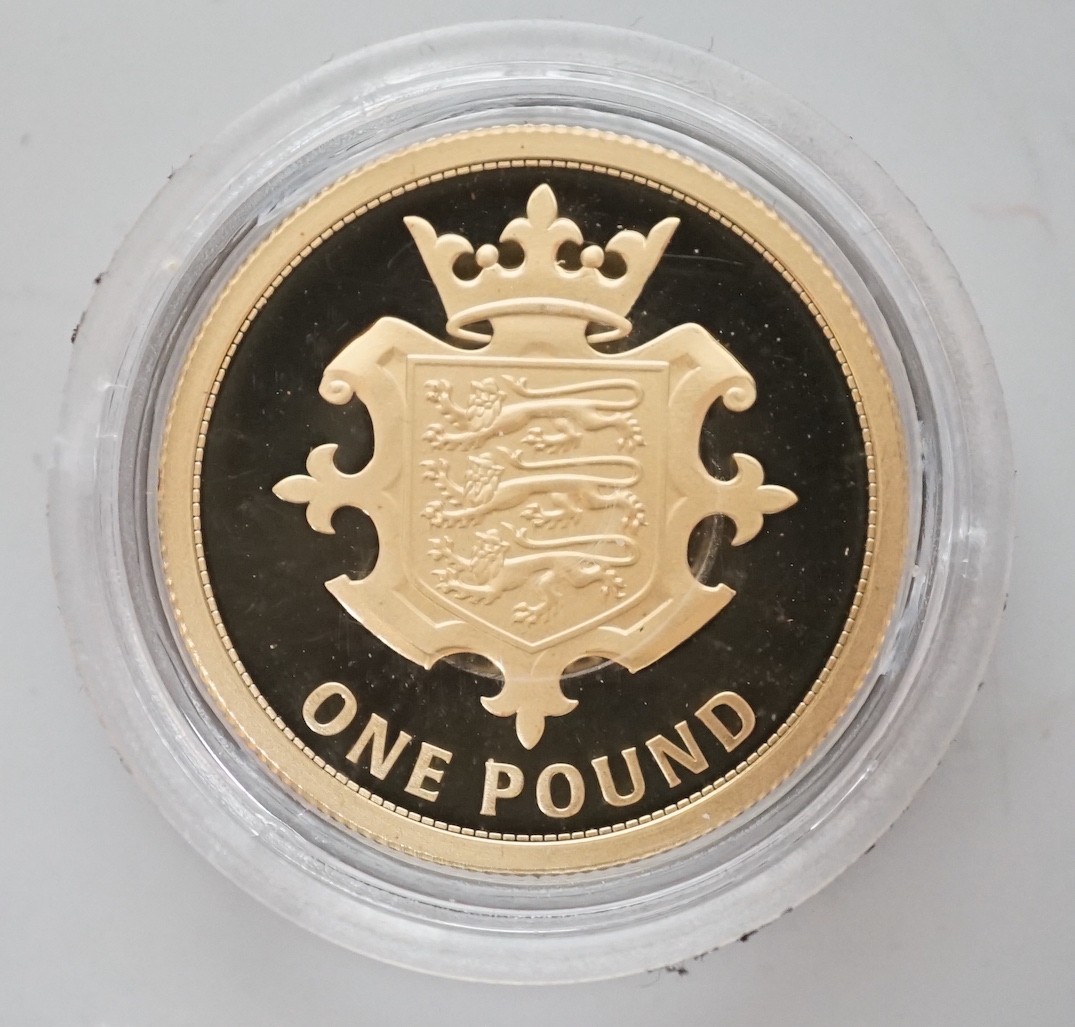 A 2014 Jersey 22ct gold Proof £1 coin, with box and certificate.